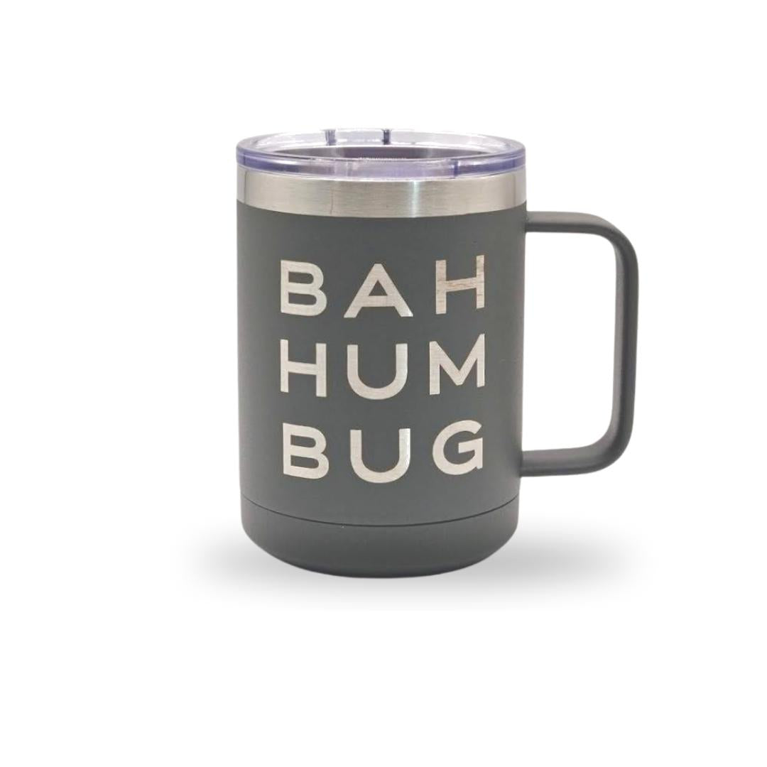 A gray stainless steel mug with "BAH HUM BUG" laser-engraved on the front.