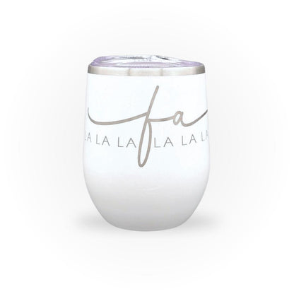 A white stainless steel wine tumblerwith "Fa la la la la" laser-engraved on the front.